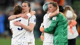 USA players comfort each other after being eliminated during the penalty shootout in the FIFA Women's World Cup in Melbourne Sunday, August 6, 2023.