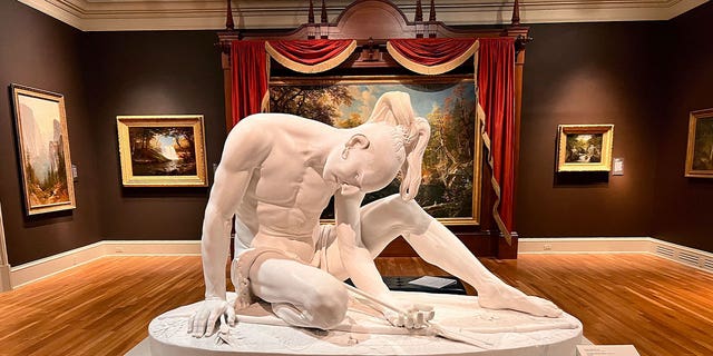 Wounded Indian sculpture
