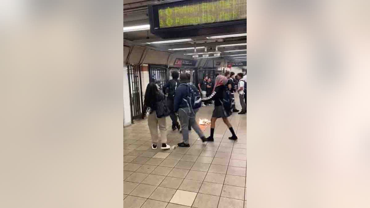subway riders on platform
