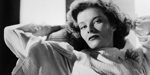 A close-up of Katharine Hepburn in a black and white glamour shot