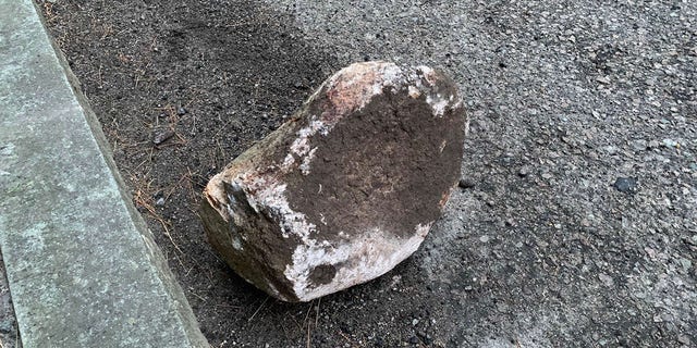 Massachusetts rock allegedly left in road