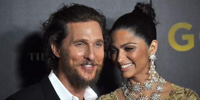 Matthew McConaughey and Camila Alves attend a premiere