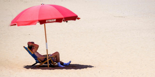 A Delaware beachgoer in the heat