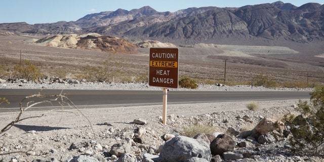 A Death Valley extreme heat warning sign