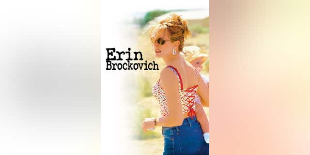 Erin Brockovich movie poster with baby on woman's hip