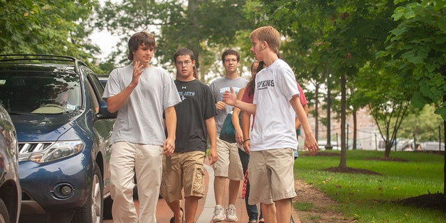 Students walking around college campus
