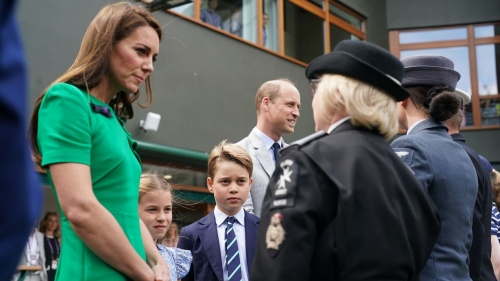 Kate, Charlotte, George and William speak to Flt Sgt Jacquie Crook Royal Air Force, Pam West Tactical Commander St. John's Ambulance and Lt Cdr Chris Boucher Royal Navy as they arrive.