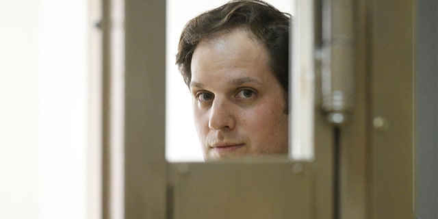 Wall Street Journal reporter Evan Gershkovich in a Russian court