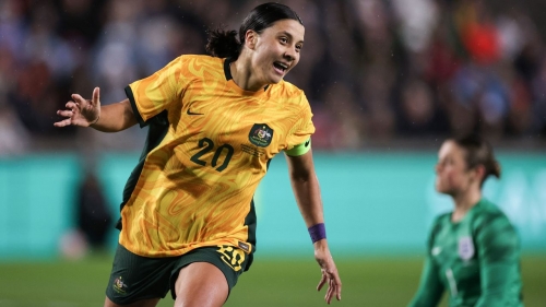 BRENTFORD, ENGLAND - APRIL 11: Sam Kerr of Australia celebrates after scoring the team's first goal during the Women's International Friendly match between England and Australia at Gtech Community Stadium on April 11, 2023 in Brentford, England.