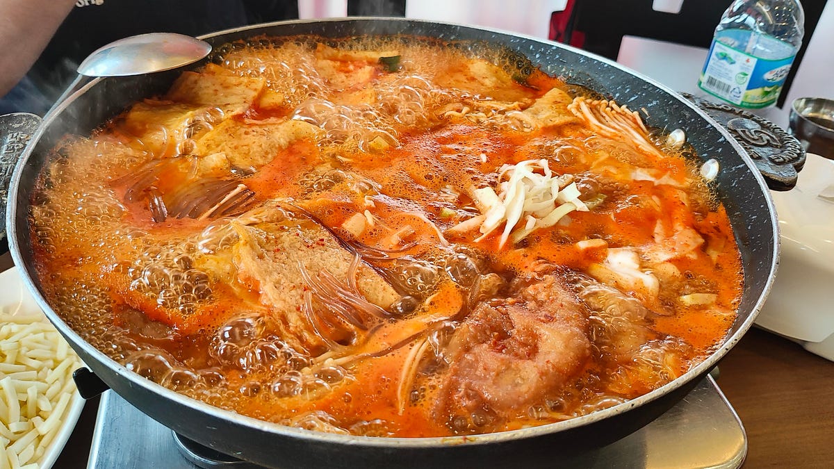 A photo of simmering tteokbokki, a popular Korean dish, taken on the Motorola Razr Plus.