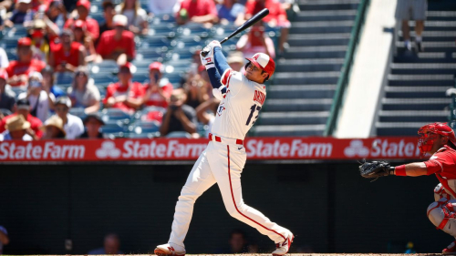 ANAHEIM, CALIFORNIA - AUGUST 23:  Shohei Ohtani #17 of the Los Angeles Angels hits a two-run home run against the Cincinnati Reds in the first inning during game one of a doubleheader at Angel Stadium of Anaheim on August 23, 2023 in Anaheim, California. (Photo by Ronald Martinez/Getty Images)
