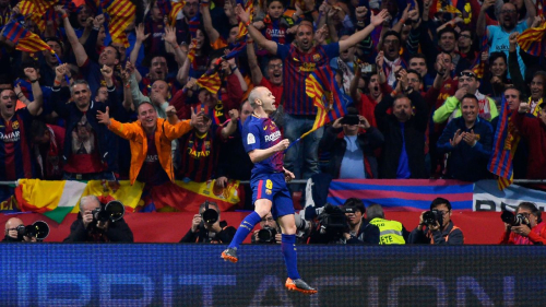 Barcelona's Spanish midfielder Andres Iniesta celebrates after scoring a goal during the Spanish Copa del Rey (King's Cup) final football match Sevilla FC against FC Barcelona at the Wanda Metropolitano stadium in Madrid on April 21, 2018. (Photo by CRISTINA QUICLER / AFP)        (Photo credit should read CRISTINA QUICLER/AFP via Getty Images)