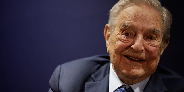 George Soros smiles