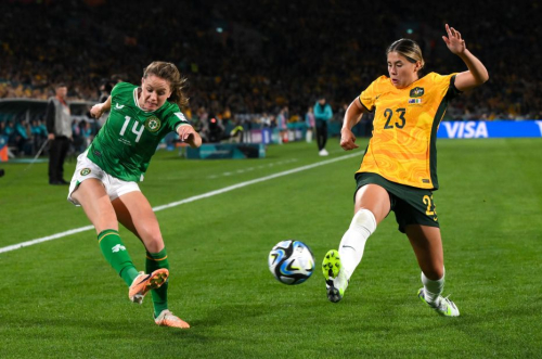 Ireland's Heather Payne, left, tries to cross the ball past Australia's Kyra Cooney-Cross. This was Ireland's first-ever match in a Women's World Cup.