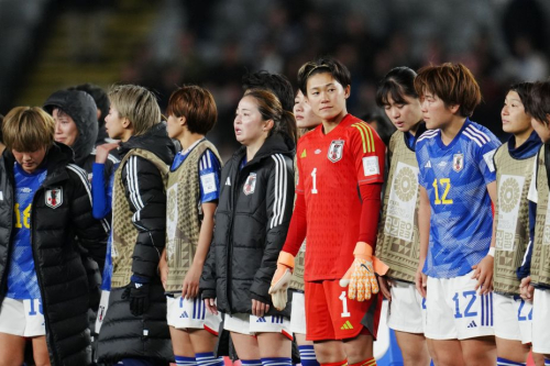 Japanese players react following the loss to Sweden. 