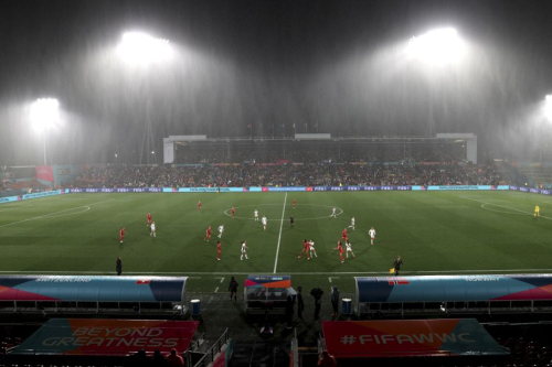 Rain pours down during the Norway-Switzerland match.