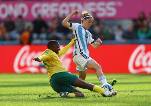 South Africa's Bambanani Mbane slides in for a tackle against Argentina's Mariana Larroquette on July 28. Their match ended in a 2-2 draw.