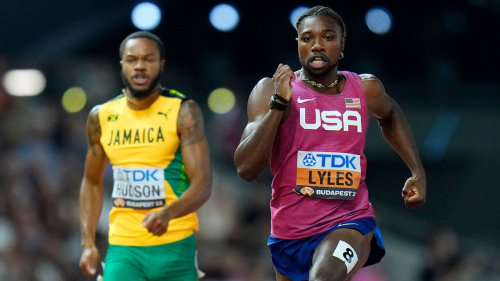 Noah Lyles, of the United States races ahead of Andrew Hudson, of Jamaica in a Men's 200-meters semifinal during the World Athletics Championships in Budapest, Hungary, Thursday, Aug. 24, 2023. (AP Photo/Petr David Josek)