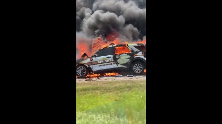  Minnesota police car engulfed in flames following highway crash