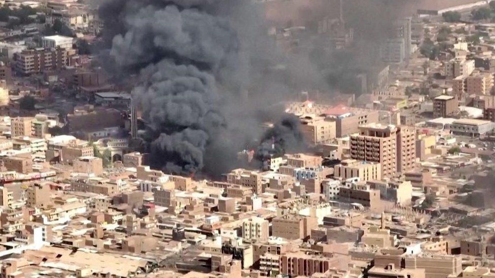 An aerial view of the black smoke and flames at a market in Omdurman, Khartoum North, Sudan, May 17, 2023 in this screengrab obtained from a handout video