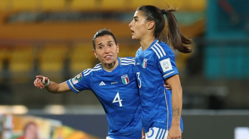 Benedetta Orsi is consoled by her teammate Lucia Di Guglielmo after scoring an own goal against South Africa.