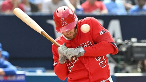 Jul 29, 2023; Toronto, Ontario, CAN; Los Angeles Angels left fielder Taylor Ward (3) is struck in the head by a pitch from Toronto Blue Jays pitcher Alek Manoah (not shown) in the fifth inning at Rogers Centre. Mandatory Credit: Dan Hamilton-USA TODAY Sports