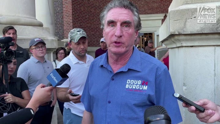North Dakota Gov. Doug Burgum questions whether all of his rivals for the GOP presidential nomination have the qualifications to serve in the White House
