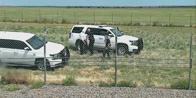 police respond to ax-wielding pilot by fence on airport property
