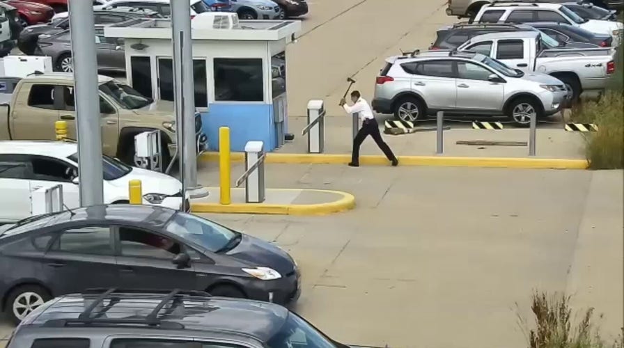 United Airlines pilot takes axe to Denver airport parking barrier