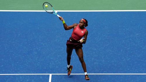 Coco Gauff of the US hits a return to Mirra Andreeva of Russia during their Women's Singles match at the 2023 US Open Tennis tournament at the USTA Billie Jean King National Tennis Center in New York on August 30, 2023. (Photo by TIMOTHY A. CLARY / AFP) (Photo by TIMOTHY A. CLARY/AFP via Getty Images)