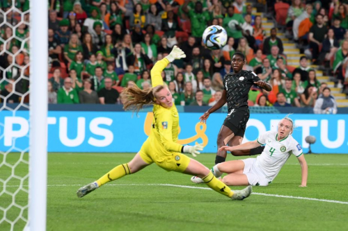 Nigeria's Asisat Oshoala, center, misses a chance against Ireland.