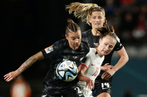New Zealand's Ria Percival and Katie Bowen, in black, compete for the ball with Norway's Caroline Graham Hansen on July 20. New Zealand won the opening match 1-0. It was the country's first-ever win at a Women's World Cup.