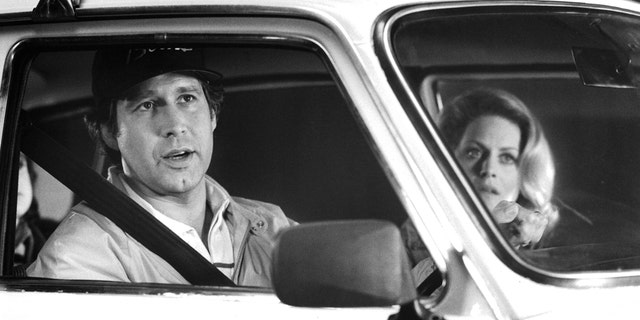 Chevy Chase and Beverly D'Angelo in a scene from European Vacation