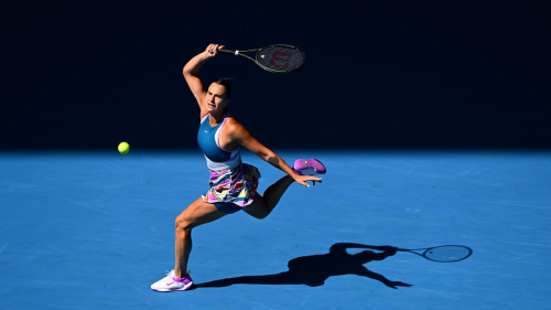 MELBOURNE, AUSTRALIA - JANUARY 23: Aryna Sabalenka of Belarus plays a forehand in the fourth round singles match against Belinda Bencic of Switzerland during day eight of the 2023 Australian Open at Melbourne Park on January 23, 2023 in Melbourne, Australia. (Photo by Quinn Rooney/Getty Images)