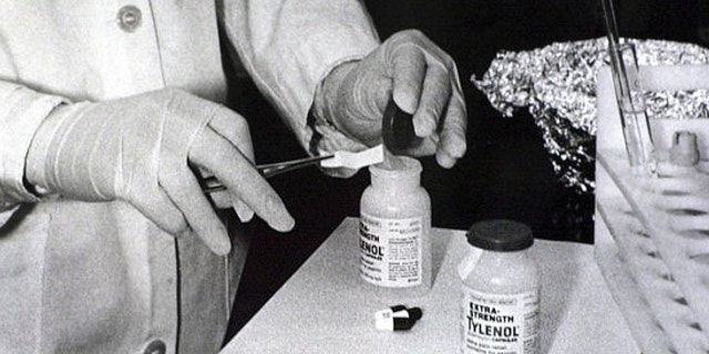 FILE: October 1982: Bottles of Extra-Strength Tylenol are tested with a chemically treated paper that turns blue in the presence of cyanide at the Illinois Department of Health in Chicago. 