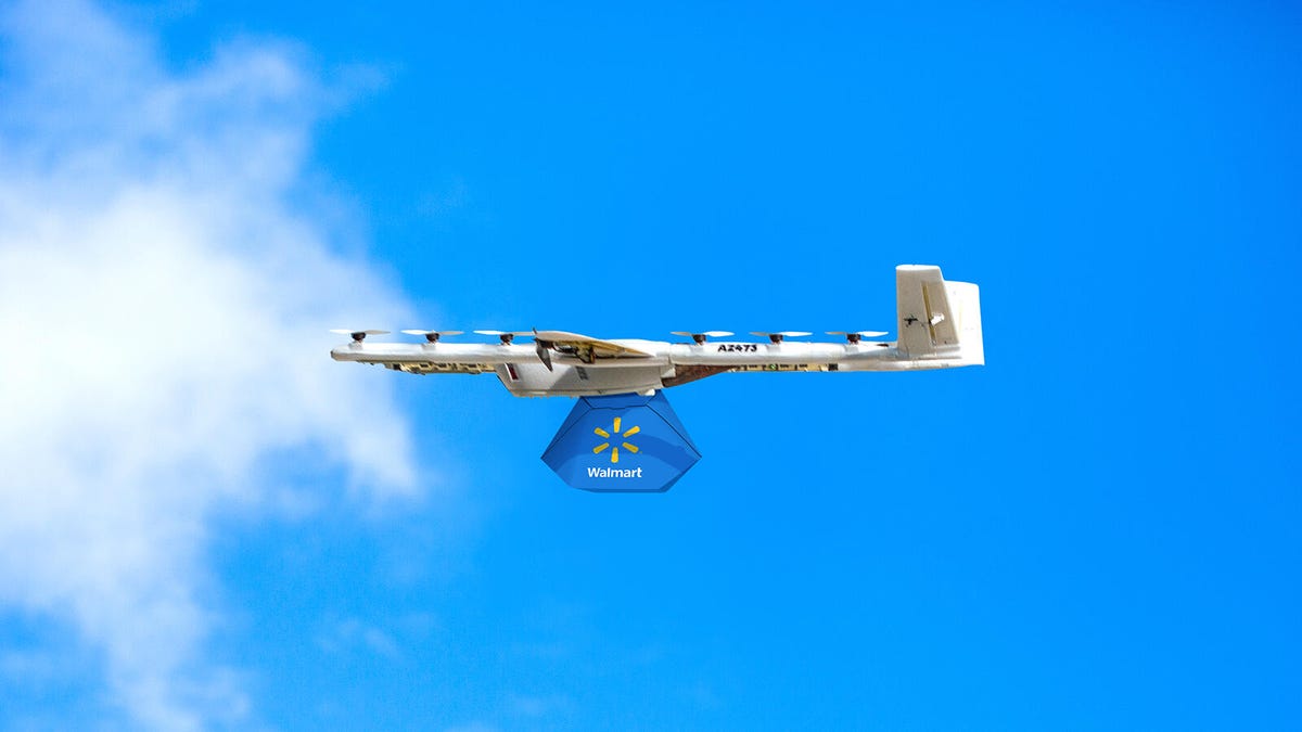 A delivery drone from Alphabet's Wing subsidiary carries a package from retail giant Walmart