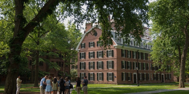 A campus tour stops on the campus of Yale University in New Haven, CT, U.S.