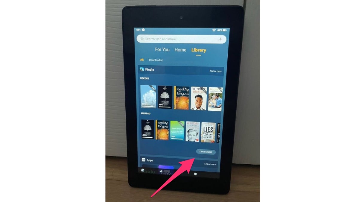 Red arrow pointing to the Open Kindle tab on Amazon Kindle