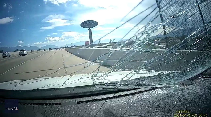 Family shocked as office chair flies into car windshield on highway