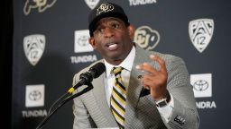 Deion Sanders speaks after being introduced as the new head football coach at the University of Colorado during a news conference Sunday, Dec. 4, 2022, in Boulder, Colo. Sanders left Jackson State University after three seasons at the helm of the school's football team. (AP Photo/David Zalubowski)