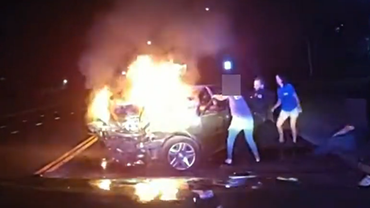 Colorado police officer rescues person from burning vehicle