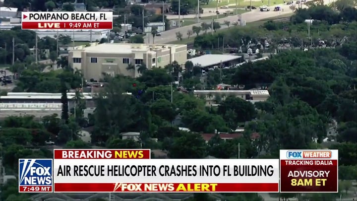 Air rescue helicopter crashes into Florida building, at least 3 injured