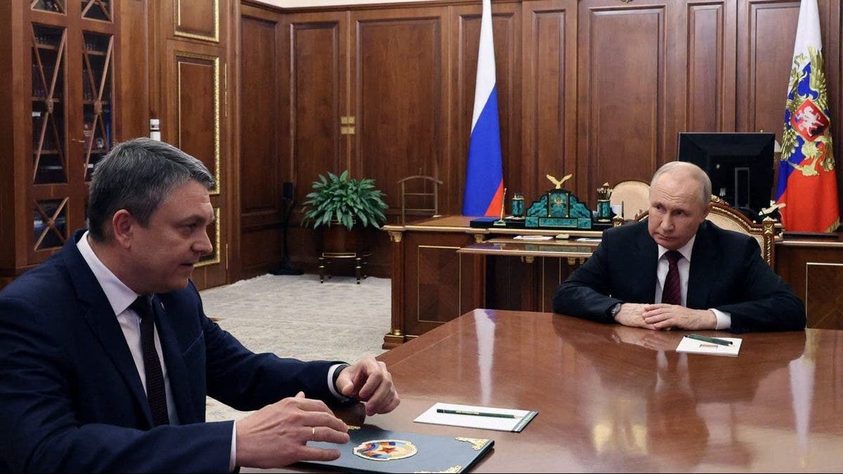 Yevgeny Balitsky and Vladimir Putin
