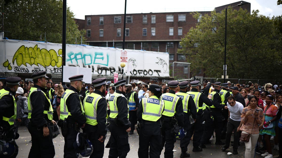 Police officers patrolling the streets during the Notting Hill Carnival in west London