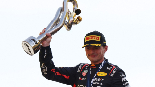 Formula One F1 - Italian Grand Prix - Autodromo Nazionale Monza, Monza, Italy - September 3, 2023 Red Bull's Max Verstappen celebrates with the trophy on the podium after winning the Italian Grand Prix