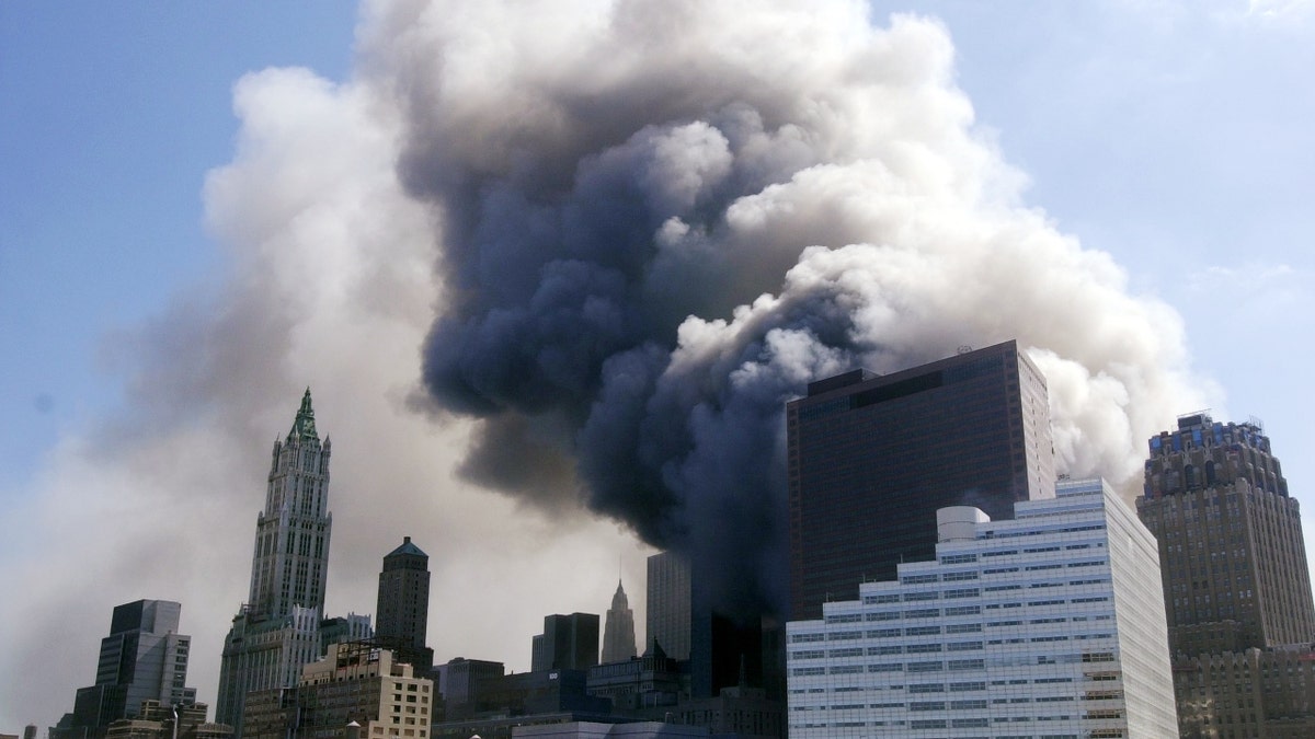 Collapsed Twin Towers up in smoke