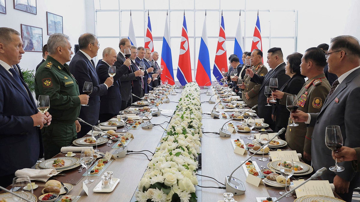 Kim Jong Un and Putin toast in Russia