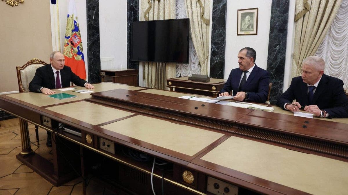 Russian President Vladimir Putin meets with Troshev