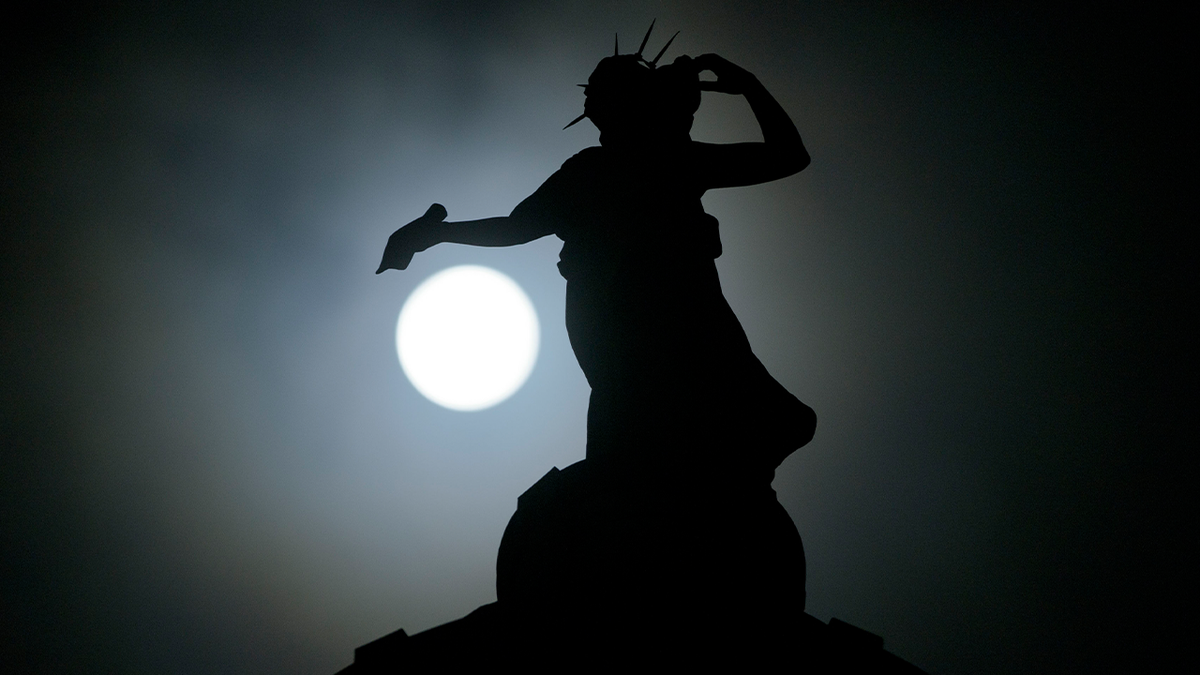 statue in moonlight
