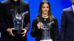 Spain's Aitana Bonmati holds the UEFA Women's Player of the Year award after the 2023/24 UEFA Champions League group stage draw at the Grimaldi Forum in Monaco, Thursday, Aug. 31, 2023. (AP Photo/Daniel Cole)